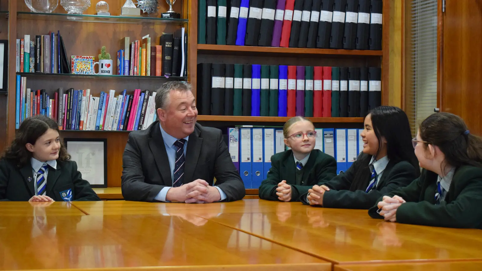 principal talking to pupils