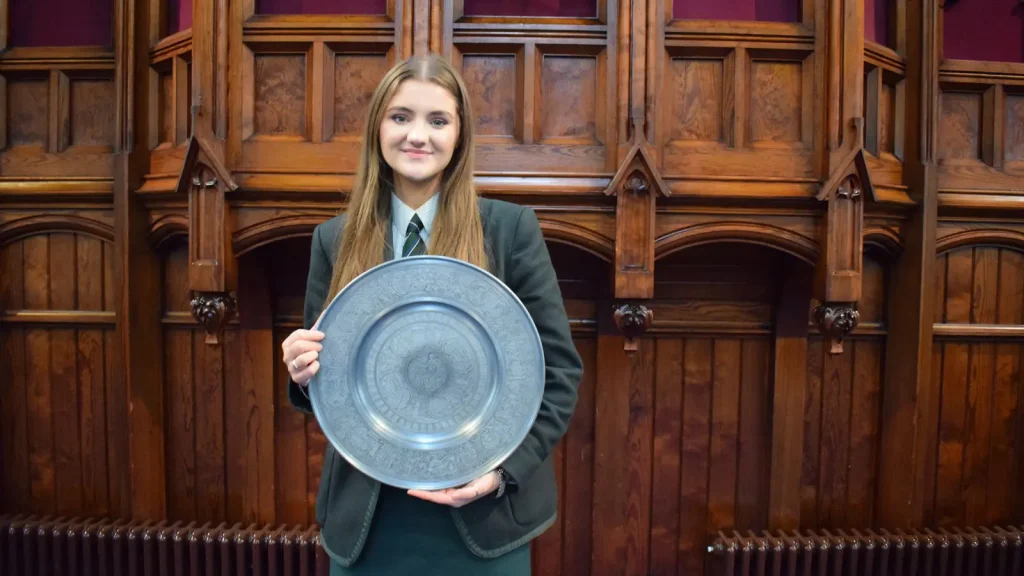Annabelle Burton collecting a prize