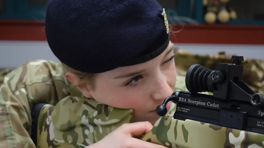soldier posing in her combat uniform