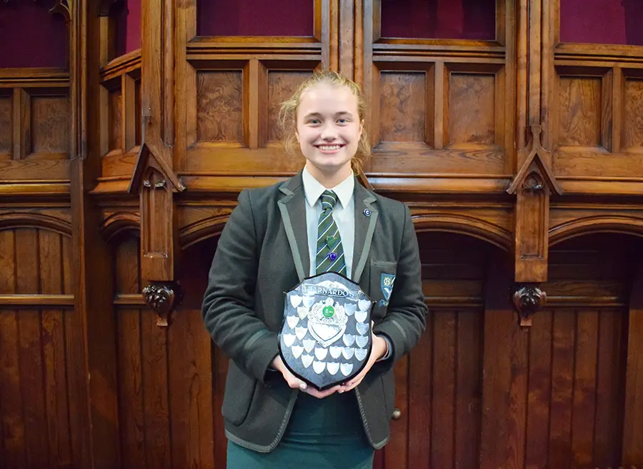 Kathryn collects the Barnardo's Shield for Charity
