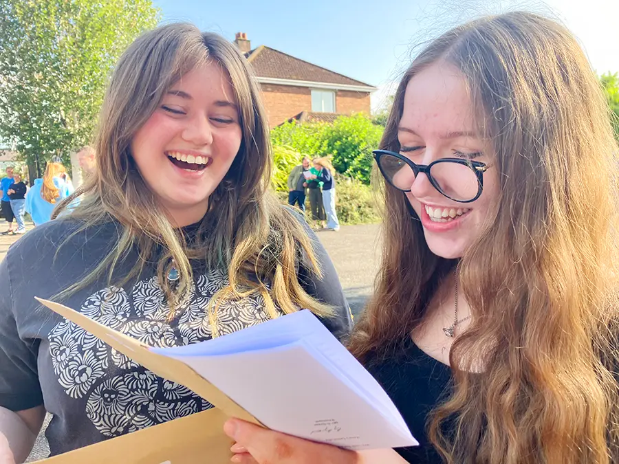 girls collecting their exam results