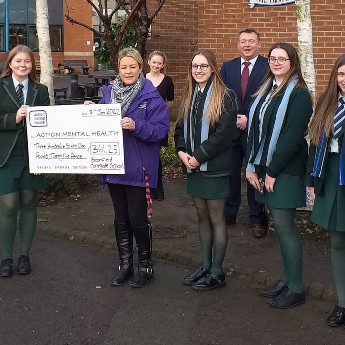 pupils presenting the cheque